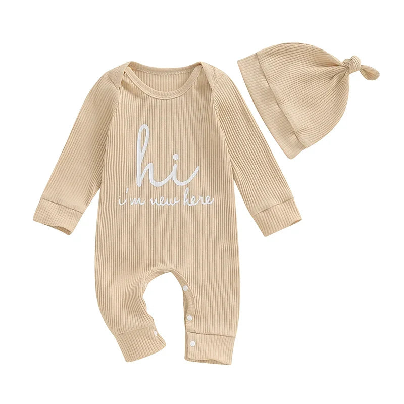 Baby boys and girls 2-piece romper set with "Hi I'm New Here" print, long sleeves, crew neck bodysuit, and hat, by August + Willow.