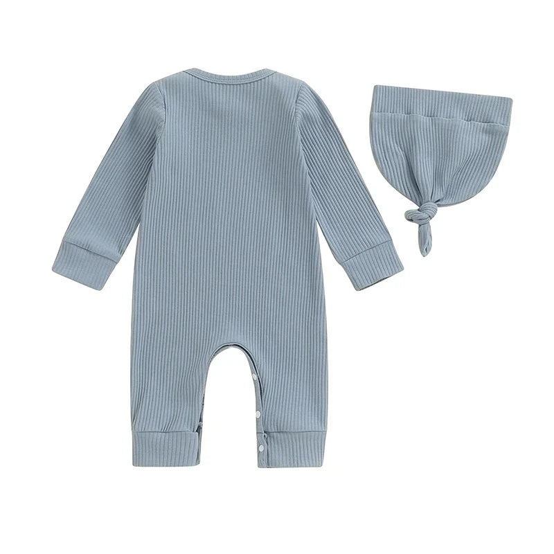 Baby boys and girls 2-piece romper set from August + Willow, long sleeve letter print jumpsuit with matching hat for ages 6-12 months.