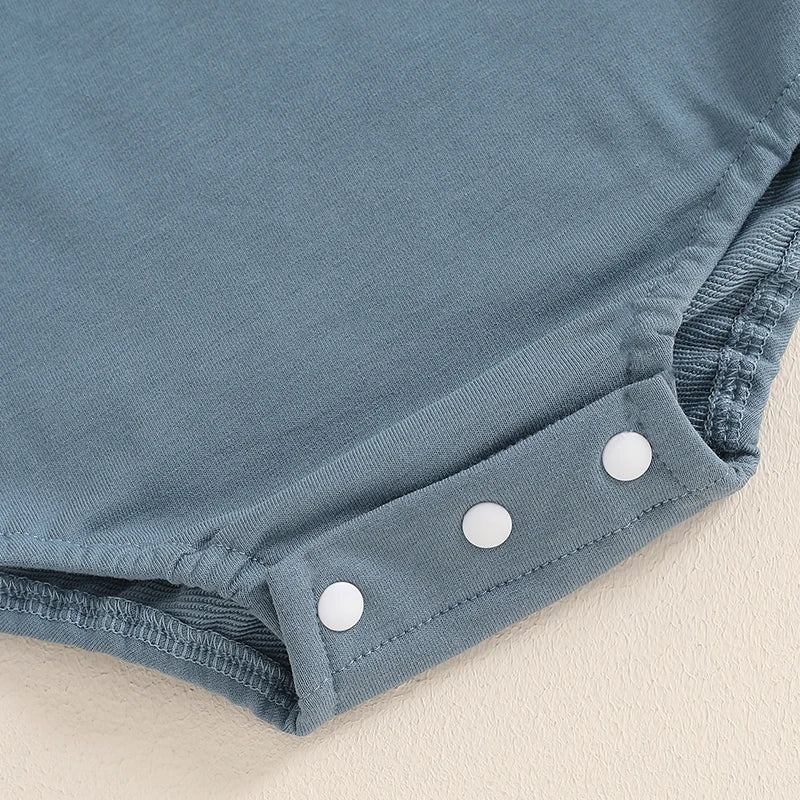 Baby boy's blue long-sleeve bubble romper by August + Willow with letter print, round neck, and comfortable bodysuit design.