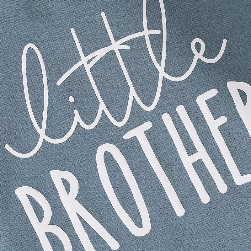 Blue baby boys Little Brother bubble romper by August + Willow, long sleeve bodysuit with letter print and round neck for 6-12 months.