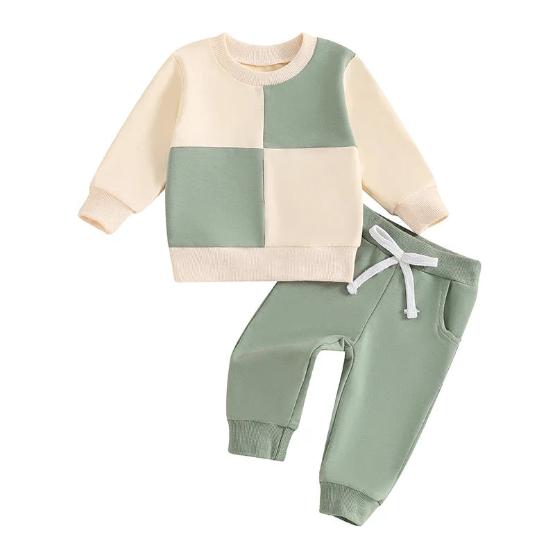 Baby toddler boys fall outfit set by August + Willow with a long sleeve contrast crewneck top and solid pants in blue for 6-12 months.