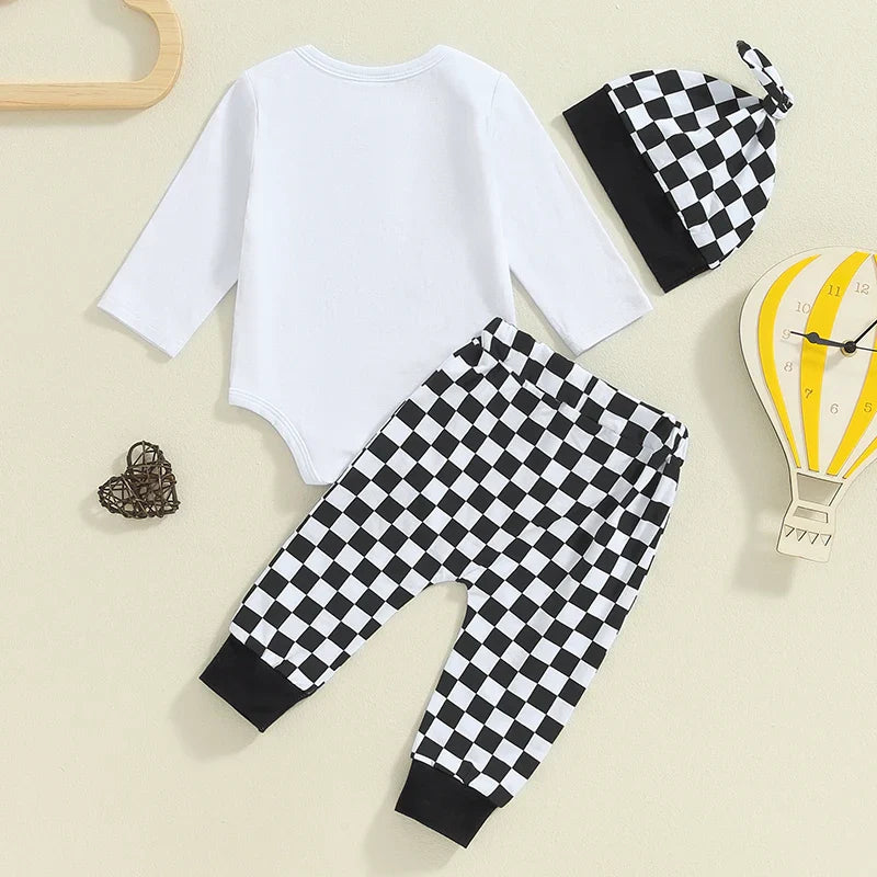 Baby boy fall outfit set by August + Willow with a letter print long sleeve romper, checker pants, and beanie hat in brown for 3-6 months.