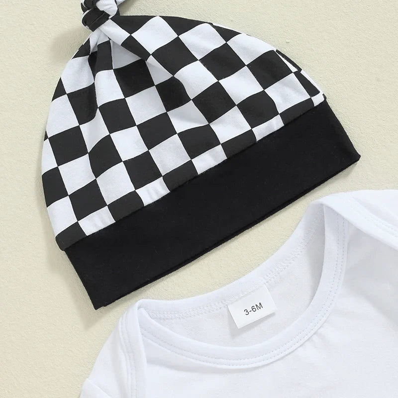 Baby boy fall outfit set by August + Willow including a letter print long sleeve romper, elastic checker pants, and beanie hat.