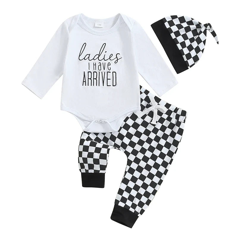 Baby boy fall outfit set by August + Willow with letter print long sleeve romper, checker pants, and beanie hat for 3-6 months.