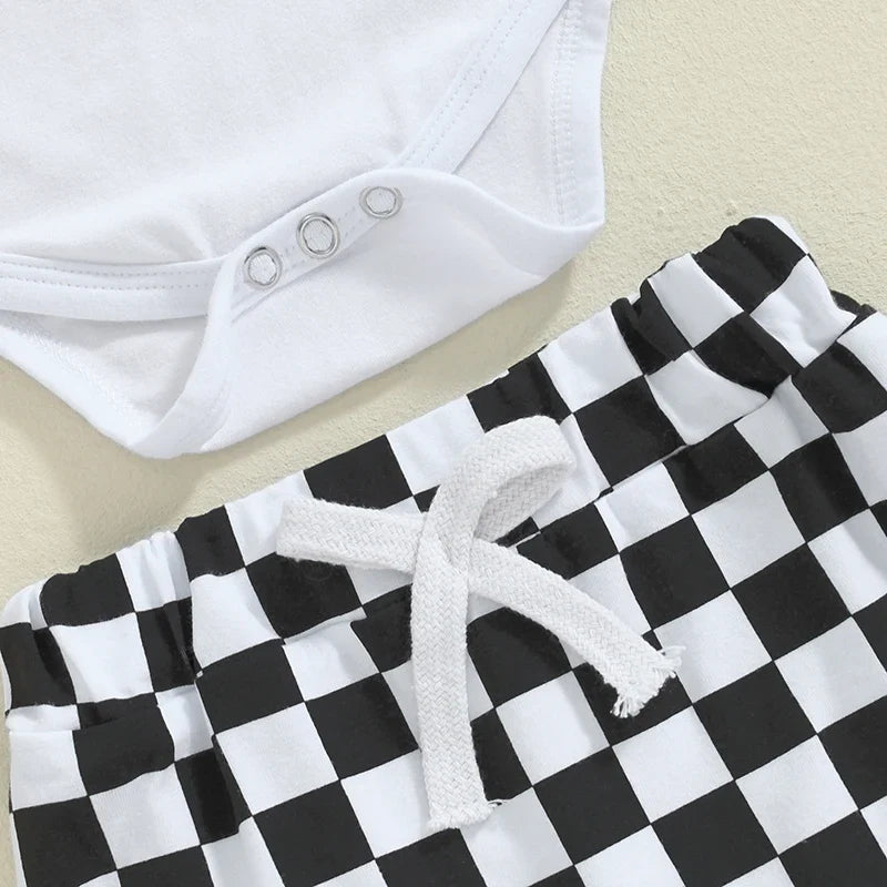Baby boy fall outfit set by August + Willow with letter print long sleeve romper, elastic checker pants, and beanie hat for 3-6 months.