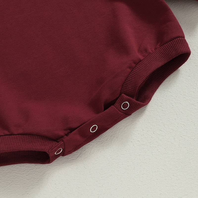 Baby girls and boys burgundy long sleeve bodysuit jumpsuit with crew neck, soft fall outfit by August + Willow, size 6 months.
