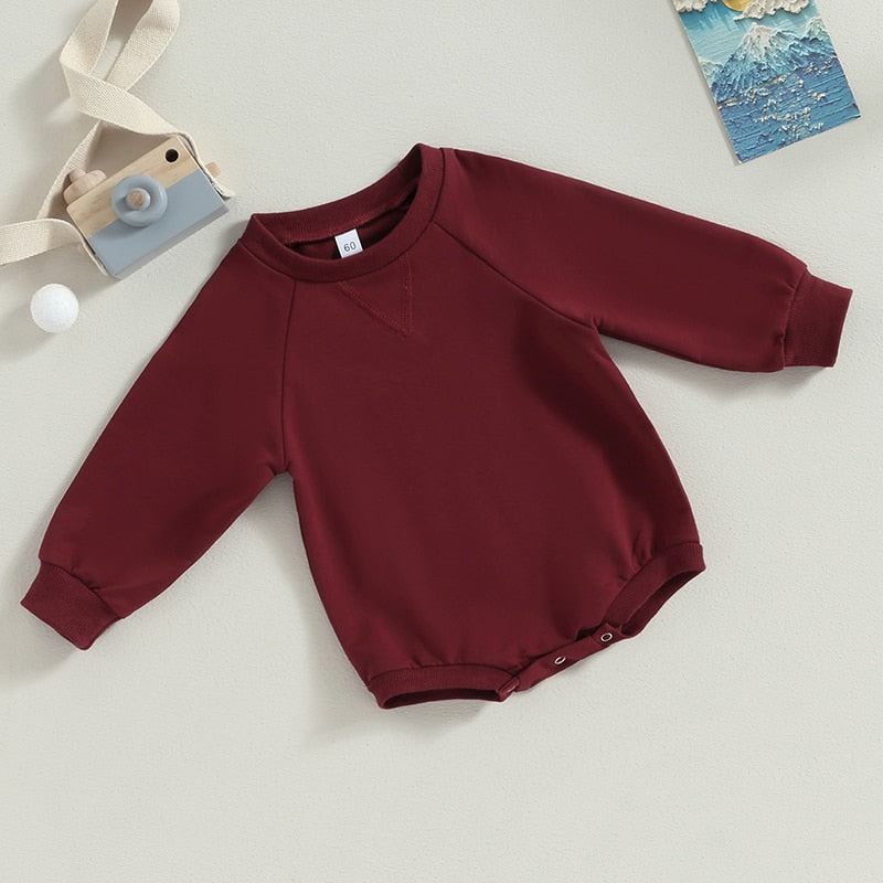 Baby girls and boys burgundy long sleeve bodysuit jumpsuit with crew neck, perfect for fall, by August + Willow.