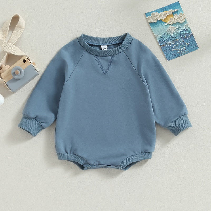 Baby girls and boys burgundy long sleeve bodysuit by August + Willow, solid crew neck jumpsuit for fall outfits.