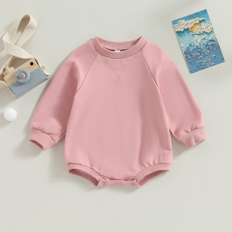 Baby girls and boys burgundy long sleeve bodysuit from August + Willow, solid crew neck jumpsuit for fall outfits, 6 months.