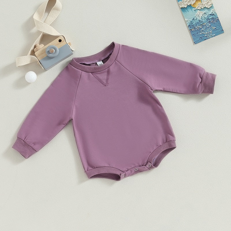 Baby girl and boy long-sleeve burgundy bodysuit jumpsuit from August + Willow, solid crew neck, perfect fall toddler outfit.