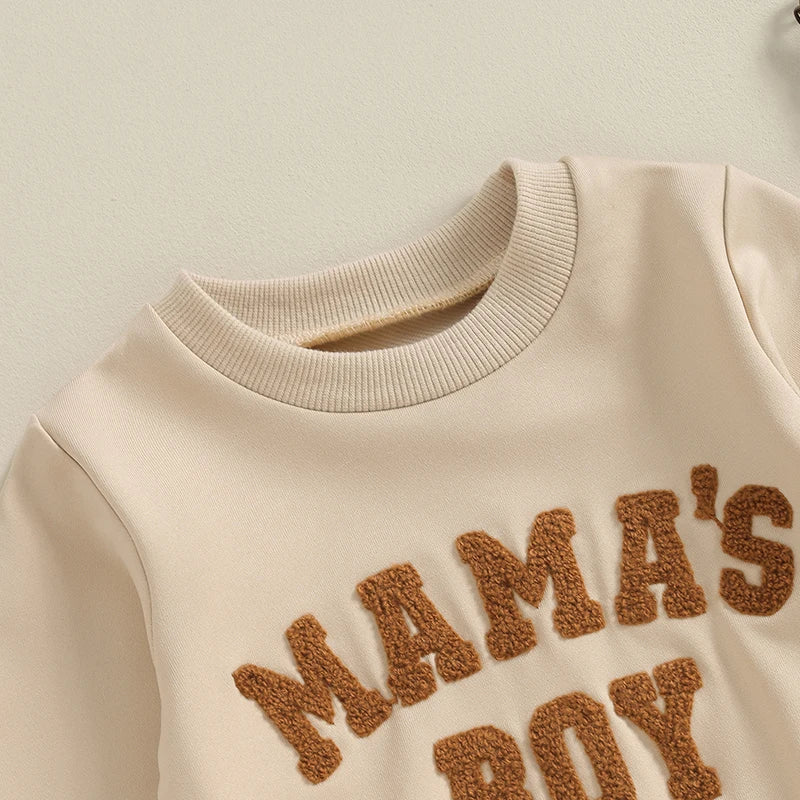 Toddler baby boy fall winter outfit set by August + Willow with gray long sleeve letter mama's boy crewneck top and jogger pants.