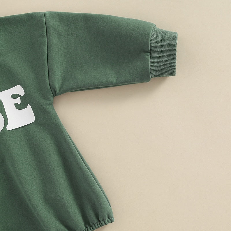 Adorable green long-sleeve baby romper for boys and girls by August + Willow, perfect for infants aged 0-3 months.