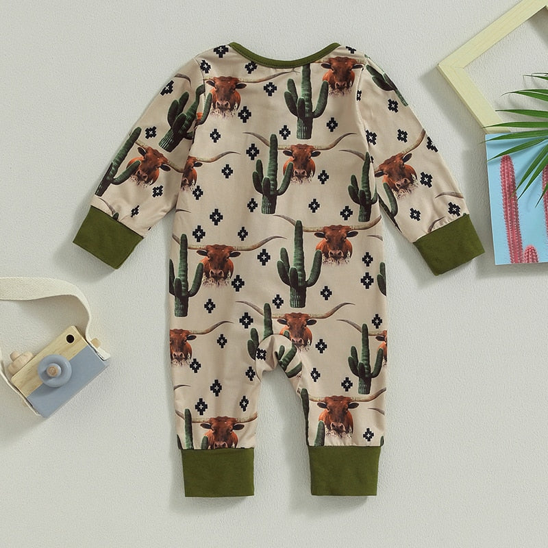 Baby jumpsuit with cow and horse print, long sleeves, zipper closure, in green for boys and girls, by August + Willow.