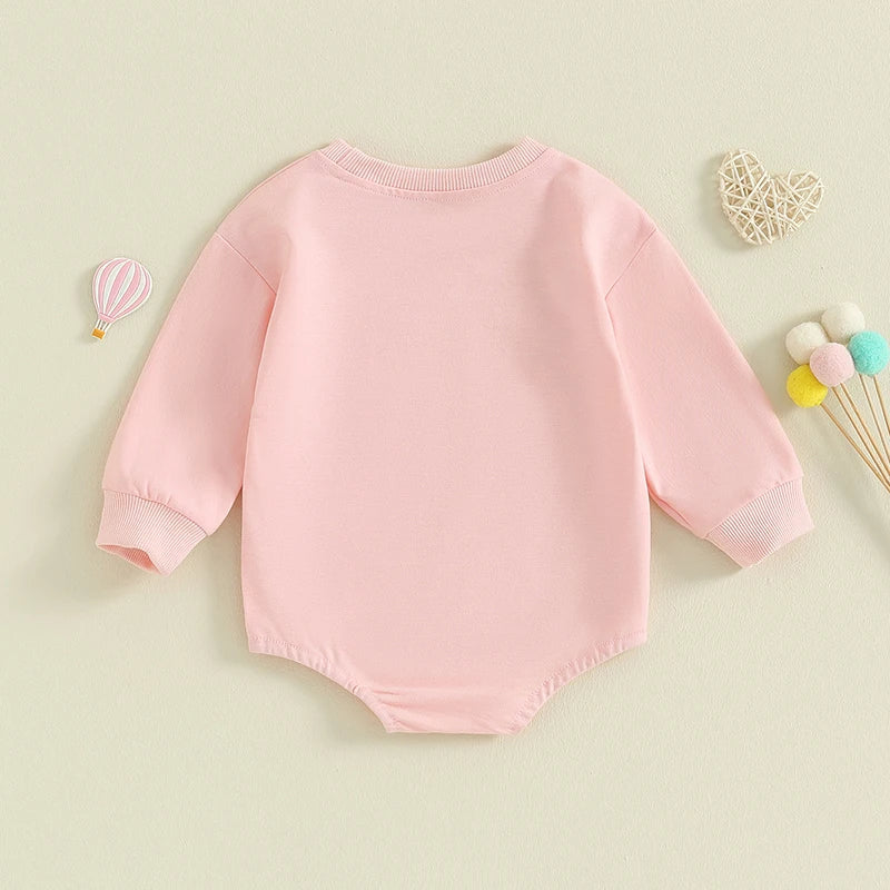 Baby girls and boys Valentine’s Day long sleeve bubble romper by August + Willow with sweet heart letter print, suitable for 0-3 months.