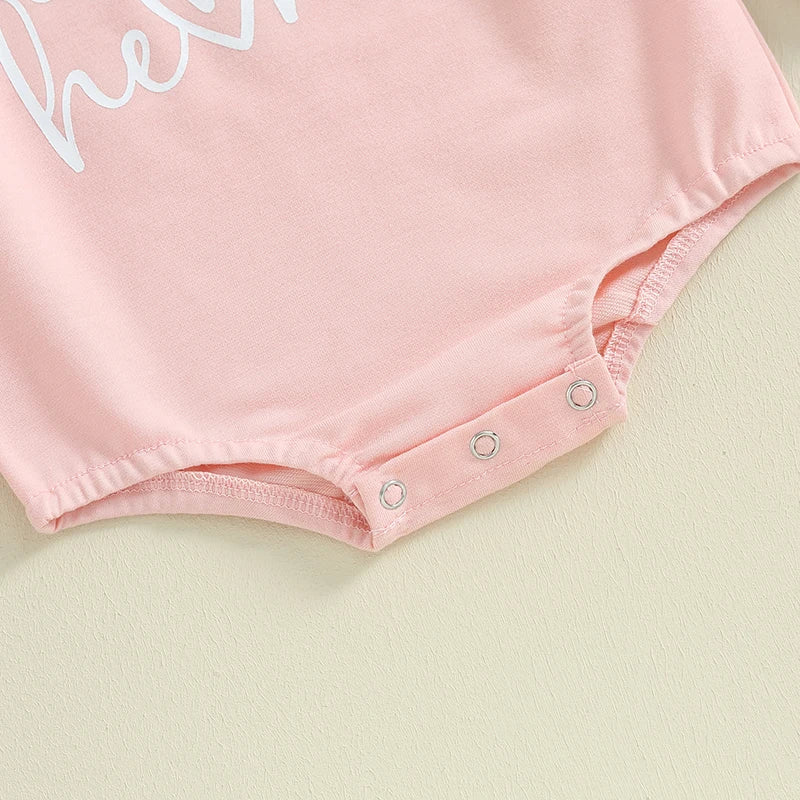 Baby girls and boys Valentine's Day long sleeve bubble romper by August + Willow with heart letter design, suitable for 0-3 months.