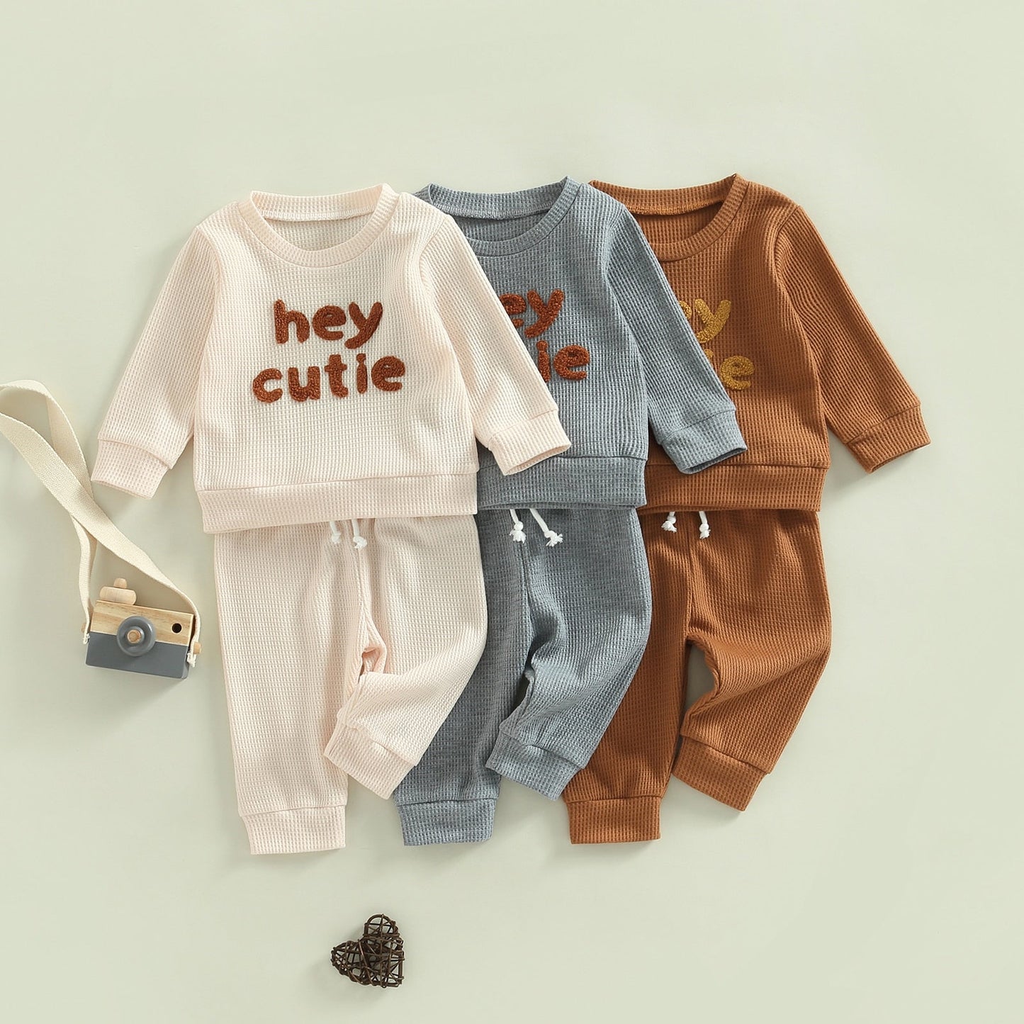 Grey 2-piece toddler outfit by August + Willow with long sleeve ribbed knit tops and matching pants for baby girl or boy.