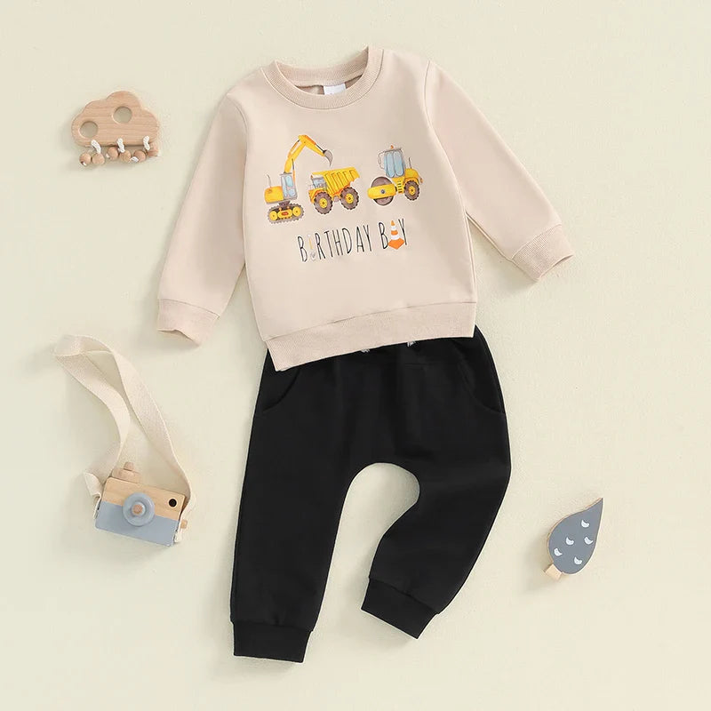 Baby toddler boys birthday outfit set with excavator and tractor print long sleeve top and pants with pockets by August + Willow.