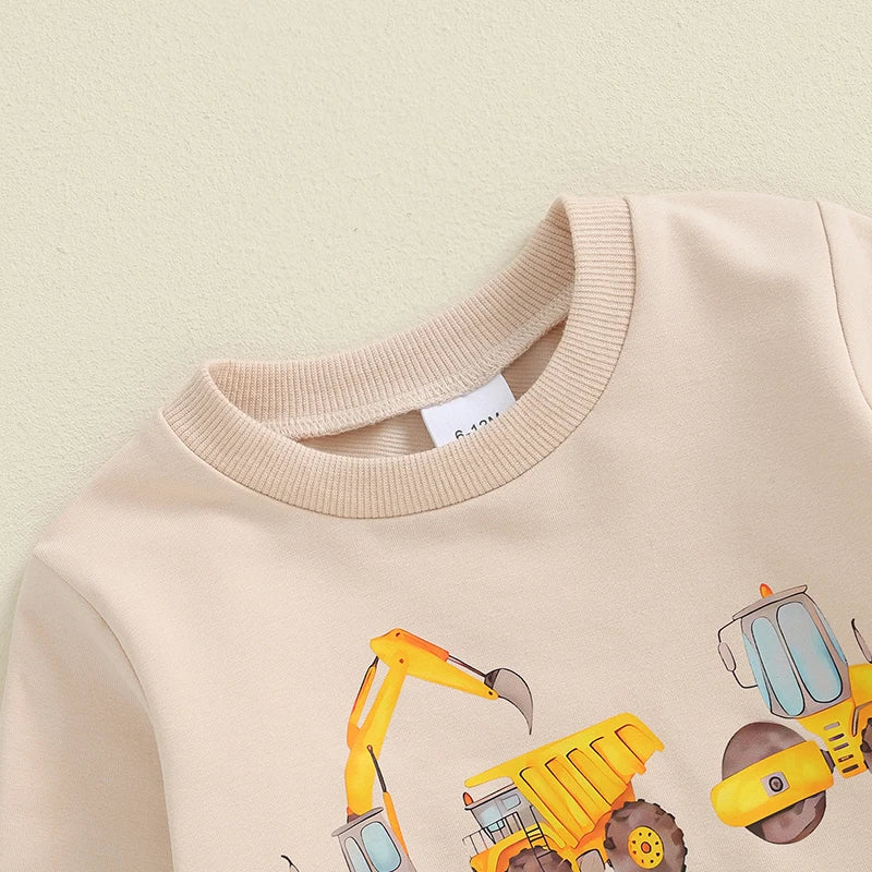Baby toddler boys' birthday outfit set with excavator and tractor print long sleeve top and pants with pockets by August + Willow.