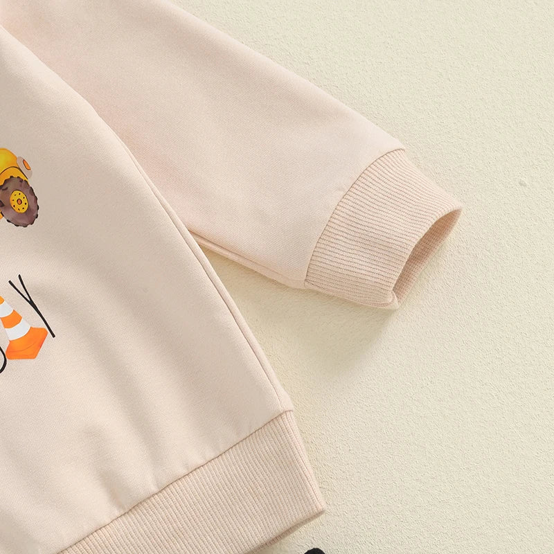 Baby toddler boys birthday outfit set with excavator and tractor print long sleeve top and pants with pockets by August + Willow.