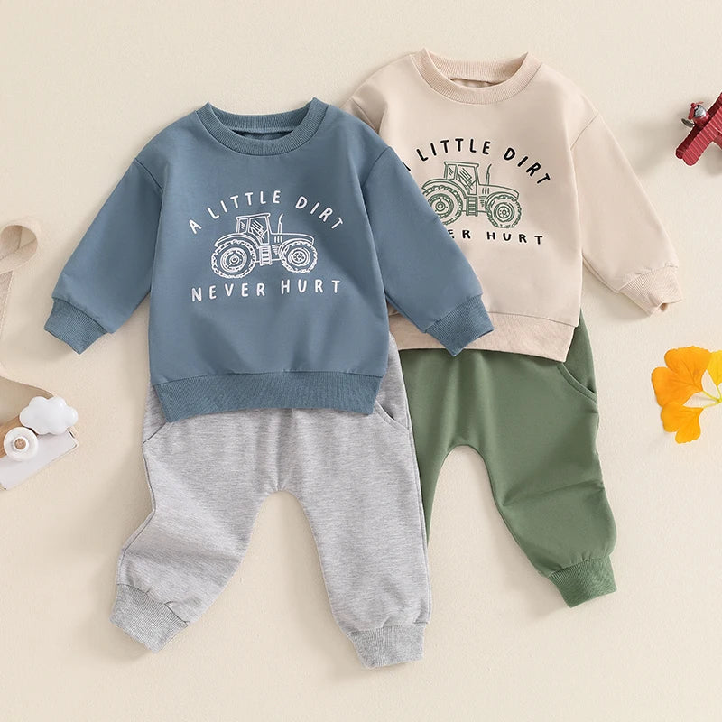 Baby toddler boys fall outfit set by August + Willow with long sleeve tractor and letter print top and matching pants, khaki color.
