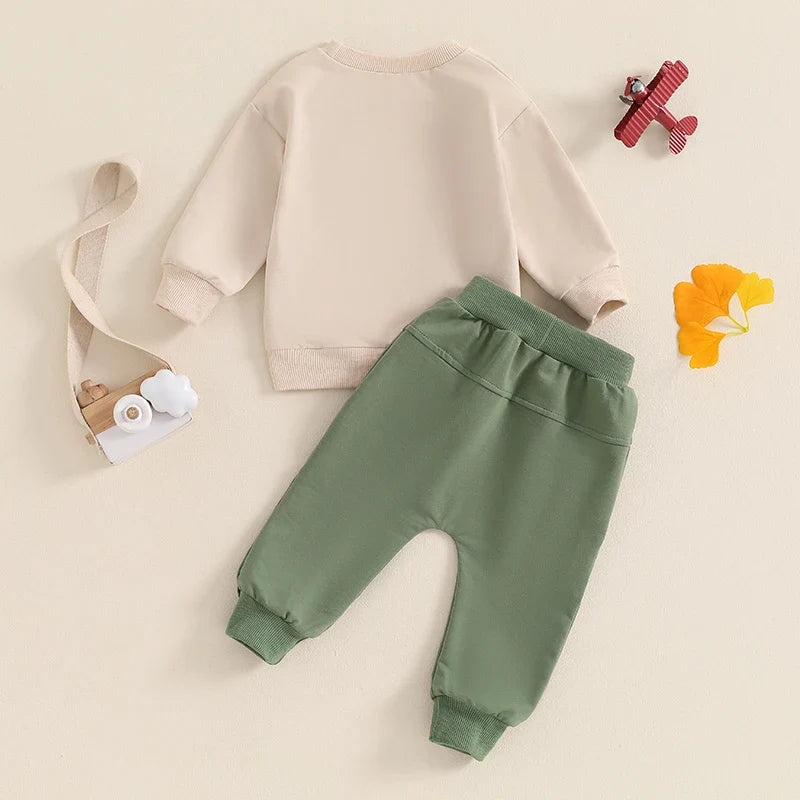 Baby toddler boys fall outfit set with long sleeve tractor print top and matching pants by August + Willow, in khaki.