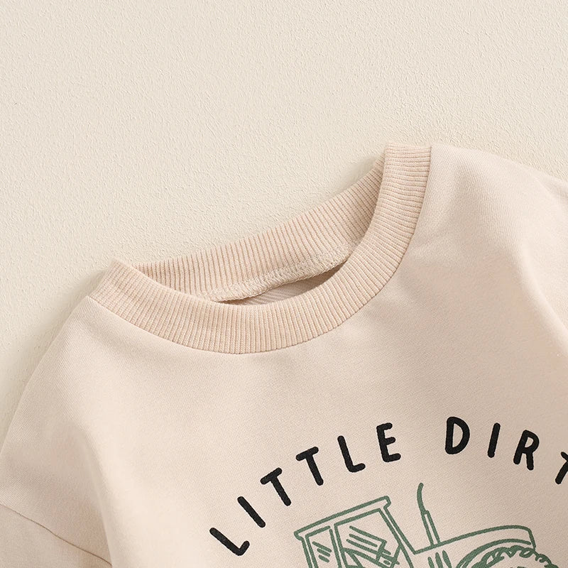 Baby toddler boys fall outfit set from August + Willow with long sleeve tractor and letter print top and matching pants.