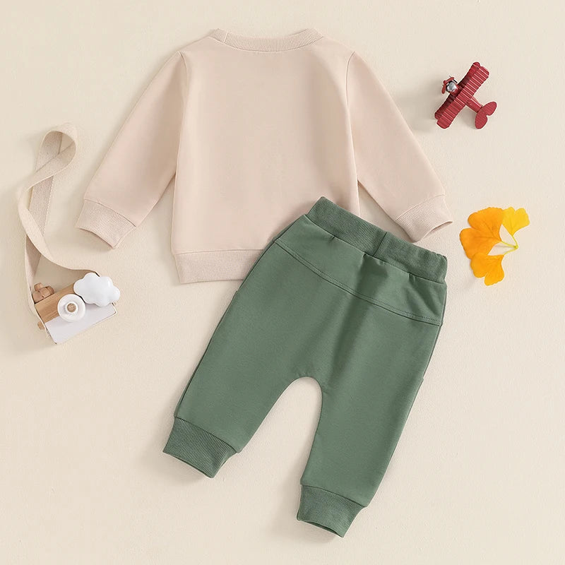 Baby toddler boys fall outfit set with tractor print long sleeve top and drawstring pocket long pants by August + Willow.