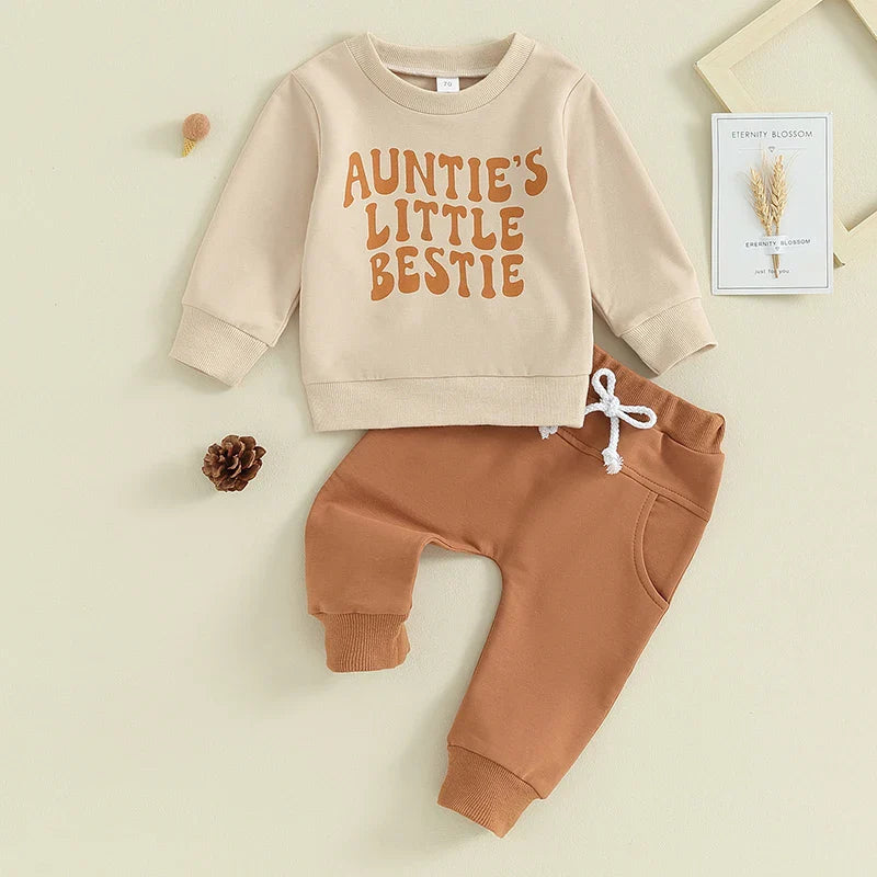 Baby toddler 2-piece outfit by August + Willow with a letter print long sleeve pullover and jogger pants for boys and girls.