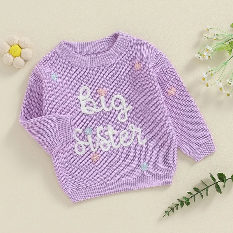 Light pink toddler girl sweater with long sleeves, letter embroidery, and a loose fit, perfect for baby and toddler outfits.