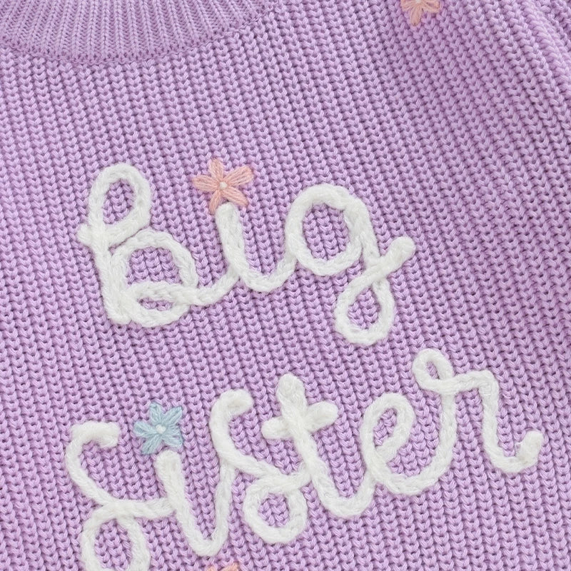 Light pink toddler girl big sister sweater with long sleeves, letter embroidery, knit fabric, loose fit, from August + Willow.