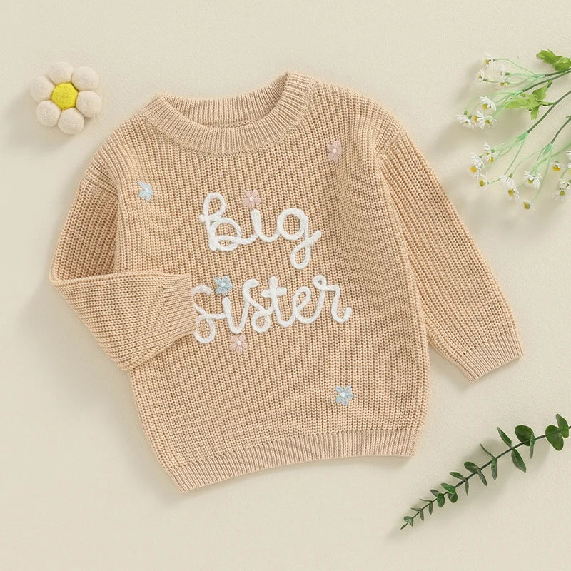 Light pink toddler girl sweater from August + Willow with long sleeves, letter embroidery, loose fit, perfect for baby and toddler outfits.