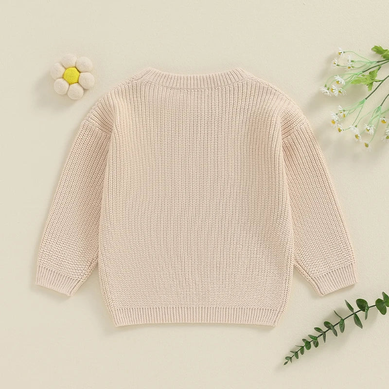 Light pink toddler girl sweater by August + Willow with long sleeves and letter embroidery, loose fit, perfect for baby and toddler outfits.