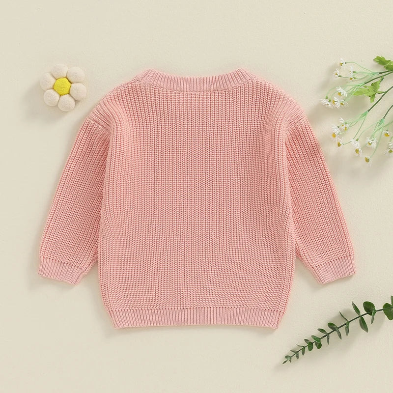 Light pink toddler girl's sweater with long sleeves, letter embroidery, and a loose fit from August + Willow baby and toddler outfits.