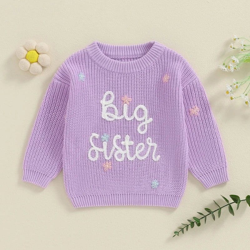 Light pink toddler girls' knit sweater with long sleeves, embroidered letter design, loose fit, from August + Willow baby and toddler outfits.