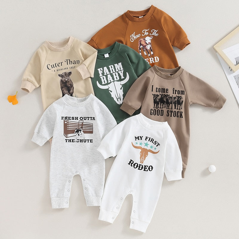 Baby boy and girl romper by August + Willow with western bull head and letter print, long sleeves, perfect for fall.