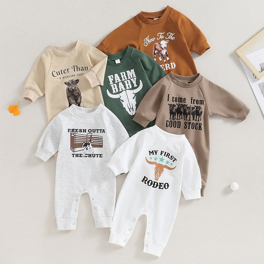 Baby boy and girl romper by August + Willow with western bull head and letter print, long sleeves, perfect for fall.