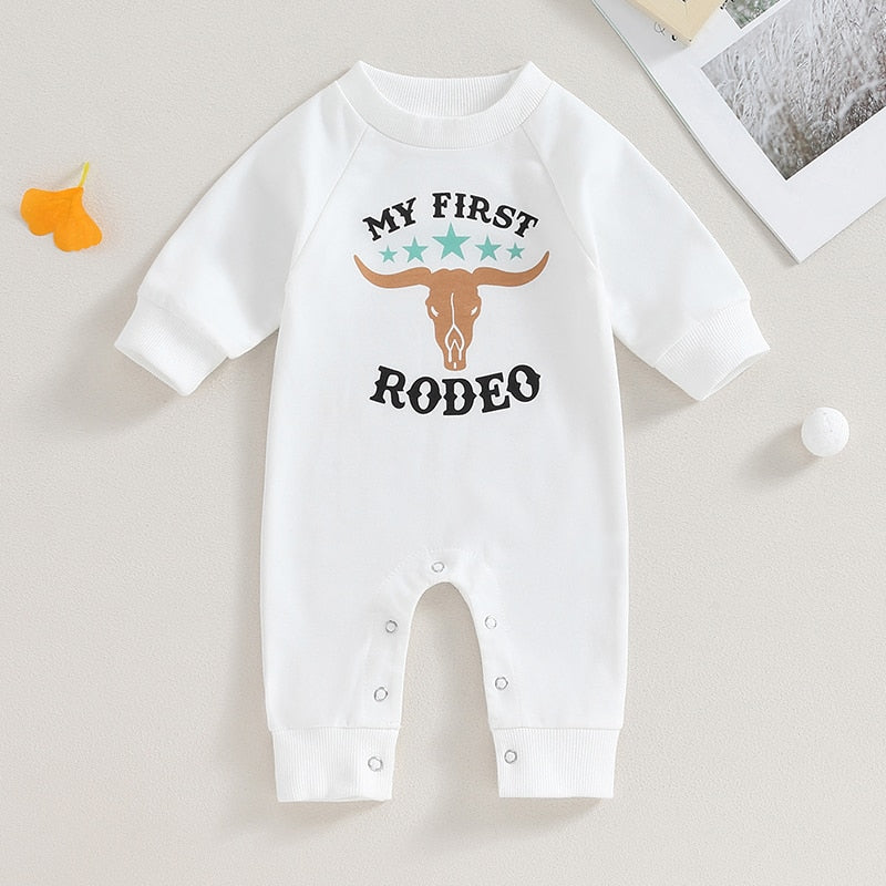 Baby boy and girl romper by August + Willow featuring western bull head and letter print, long sleeves, perfect for fall.