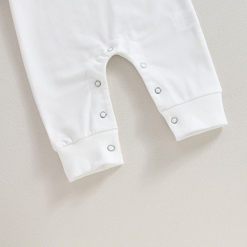 Baby romper by August + Willow featuring a western bull head and letter print, long sleeves, perfect for fall toddler outfits.