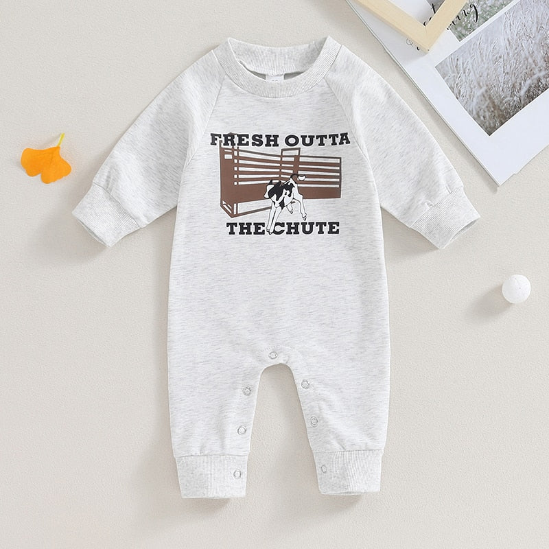 Baby boy and girl romper by August + Willow featuring western bull head and letter print, long sleeves, perfect for fall.