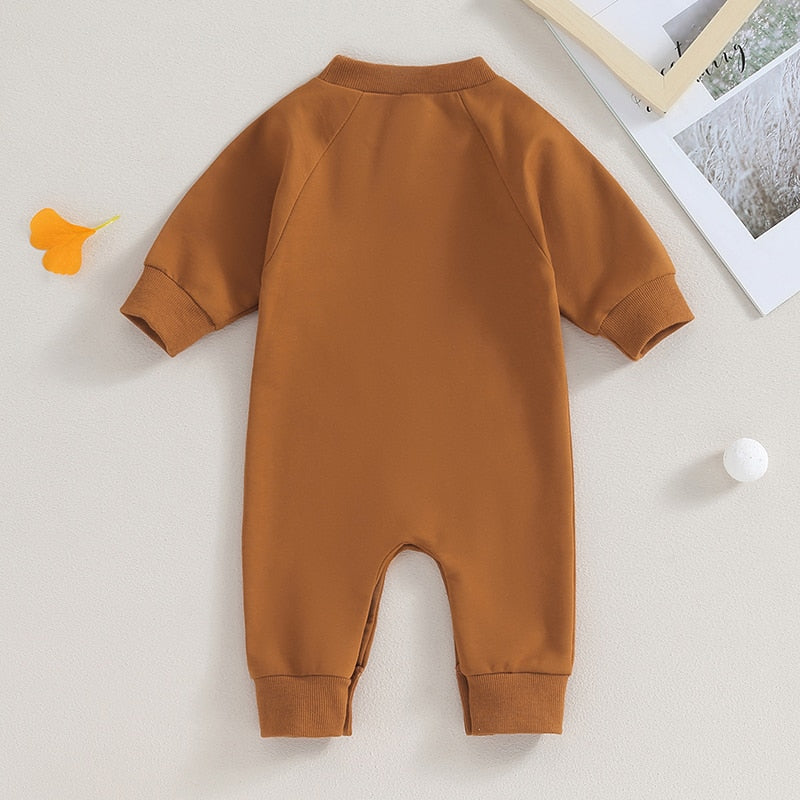 Baby boy and girl romper by August + Willow featuring western bull head and letter print, long sleeves, perfect for fall.