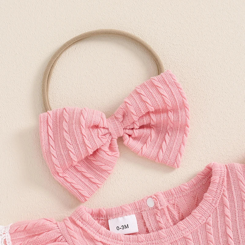 Baby girl 2-piece outfit with lace ruffled trim, ribbed long sleeves, round neck romper, and matching bow headband by August + Willow.