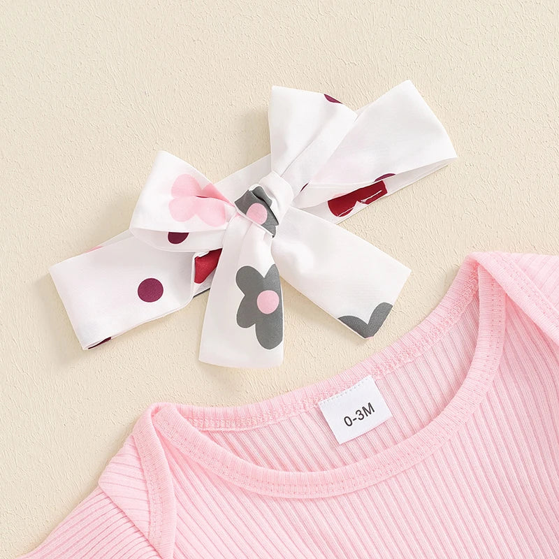 Baby girl fall outfit set with long sleeve ribbed romper, floral skirt, bow suspender, and headband in pink for 3-6 months.