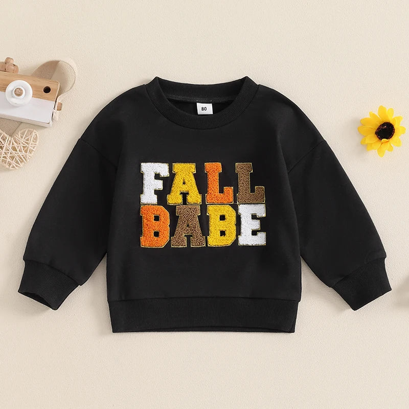 Pink fall crewneck top for babies and toddlers by August + Willow, featuring long sleeves and embroidered fall letters.