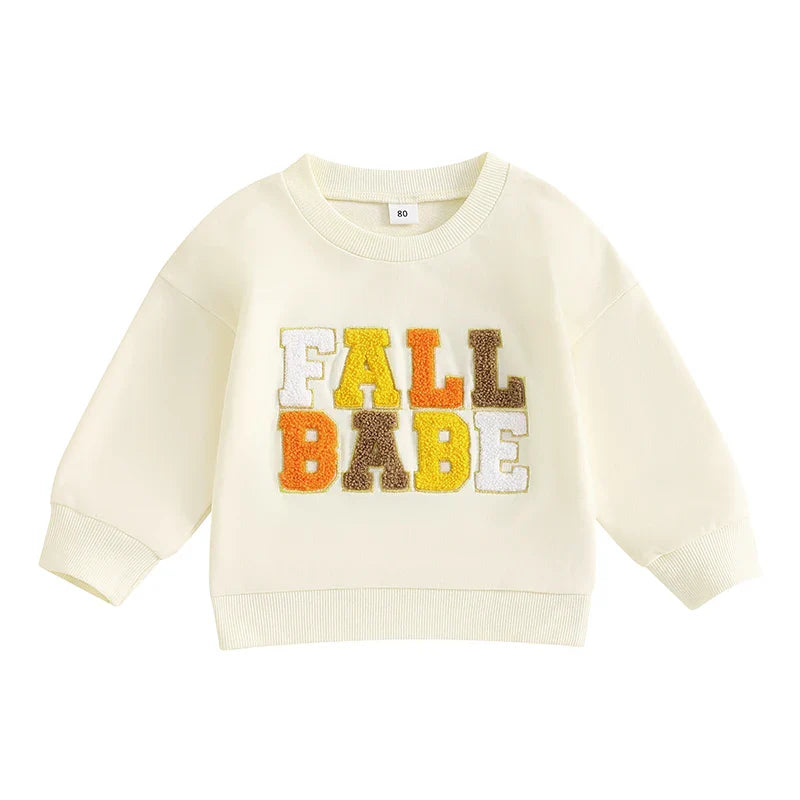 Pink baby and toddler fall crewneck top with embroidery letters, long sleeves, suitable for boys and girls from August + Willow.