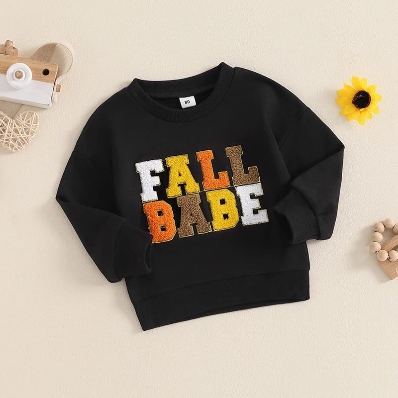 Pink long sleeve fall crewneck top for babies and toddlers by August + Willow with embroidered letter design.
