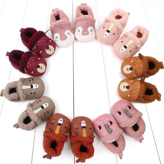 Pink animal slippers for newborns and infants with anti-slip soles, designed for first walkers, by August + Willow.