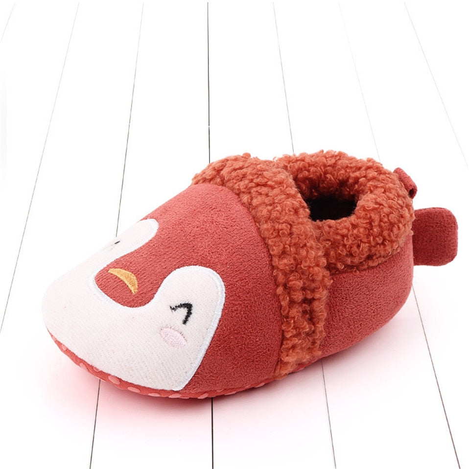 Pink animal-themed baby shoes for newborns and infants with anti-slip soles, designed for first walkers by August + Willow.