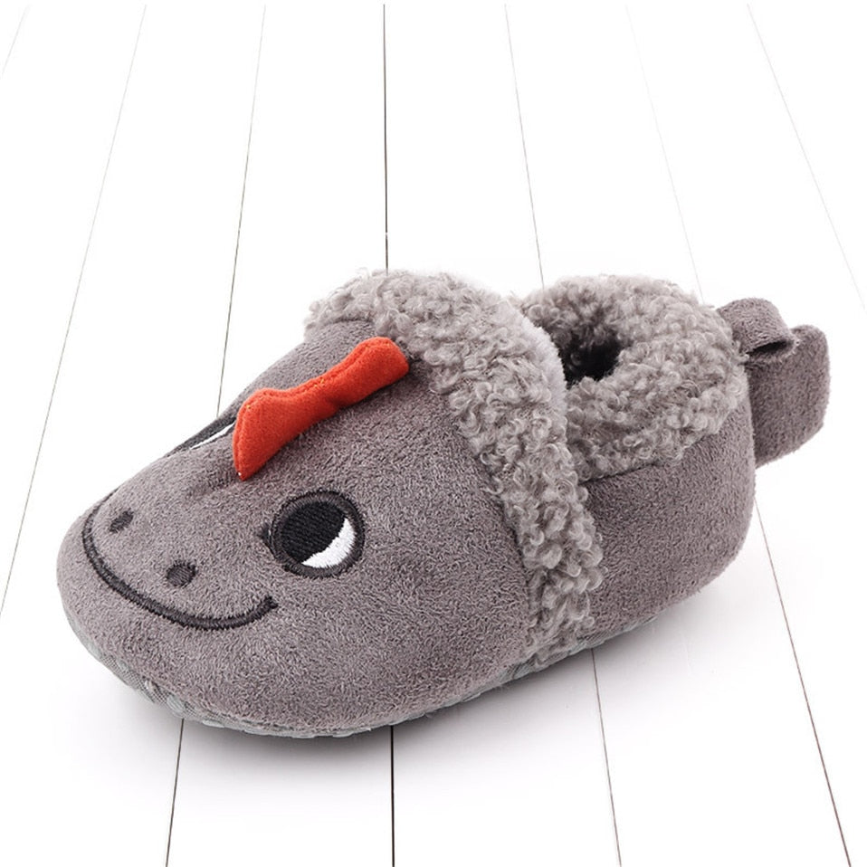 Pink animal slippers for newborns with anti-slip soles, designed for first walkers, from August + Willow baby & toddler outfits.