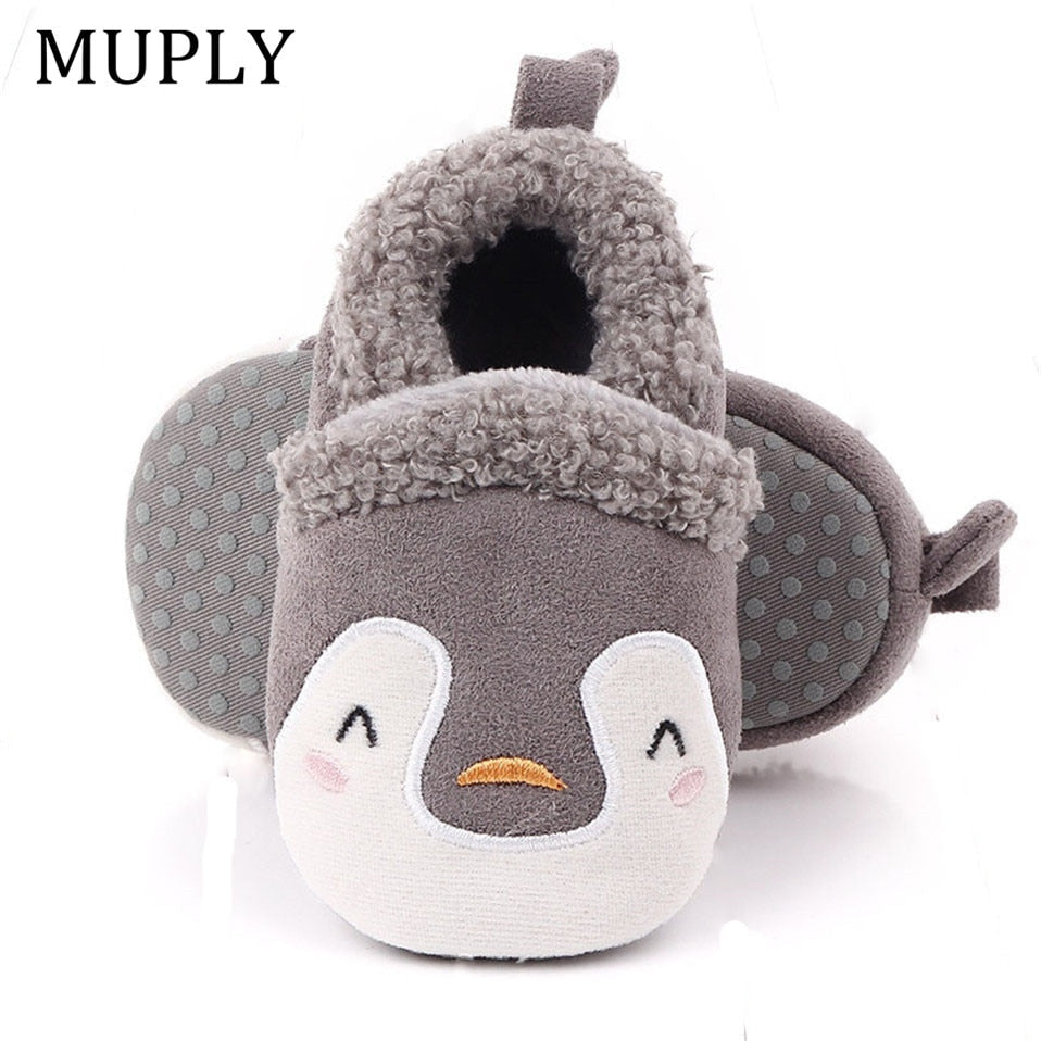 Pink penguin baby shoes for newborns, anti-slip first walker slippers by August + Willow, designed for infants 0-6 months.