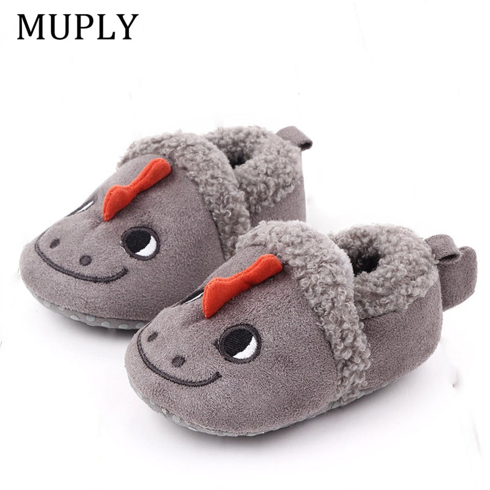 Pink penguin baby shoes for newborns, anti-slip animal slippers by August + Willow, designed for first walkers and toddlers.